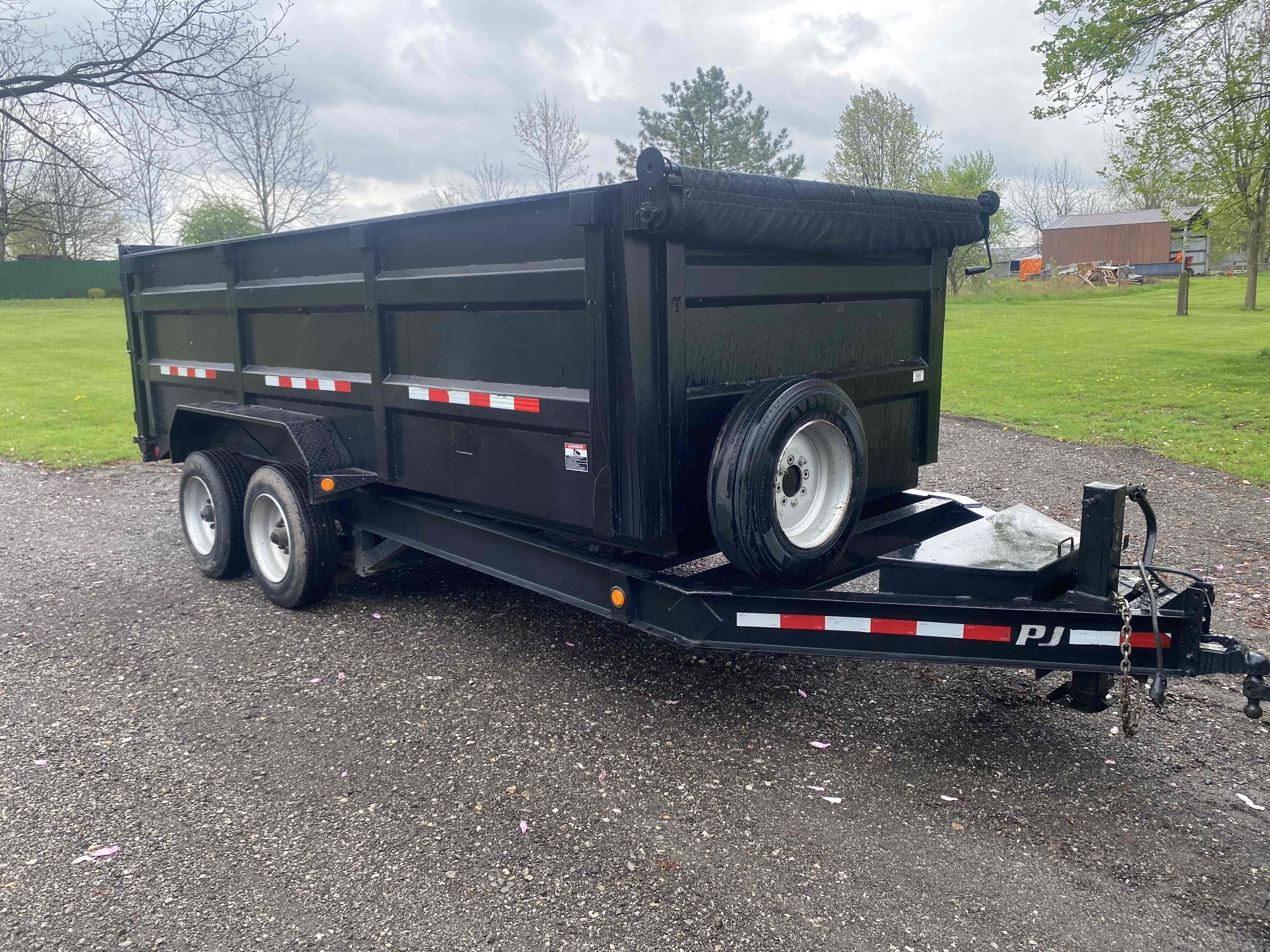 16-foot hydraulic dump trailer rental in Lebanon, IN - 14,000 lb capacity for landscaping, demolition debris, gravel, and construction materials