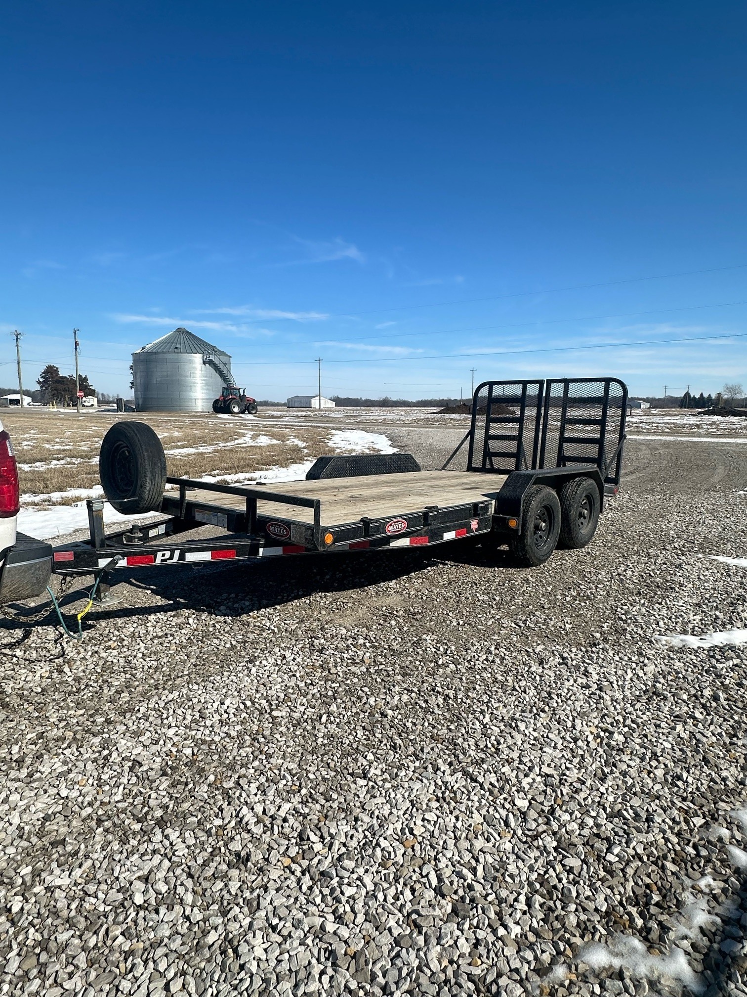 16-foot utility trailer for rent in Lafayette, IN - versatile open trailer with mesh sides for landscaping, moving, and general hauling