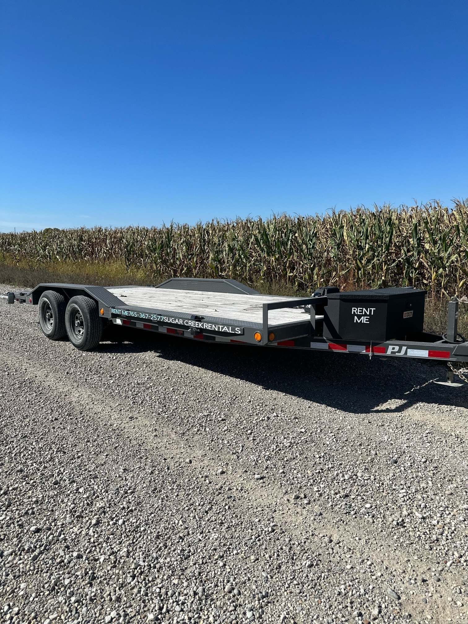 20-foot car hauler trailer for rent in Crawfordsville, IN - perfect for transporting vehicles safely with winch and tie-downs included